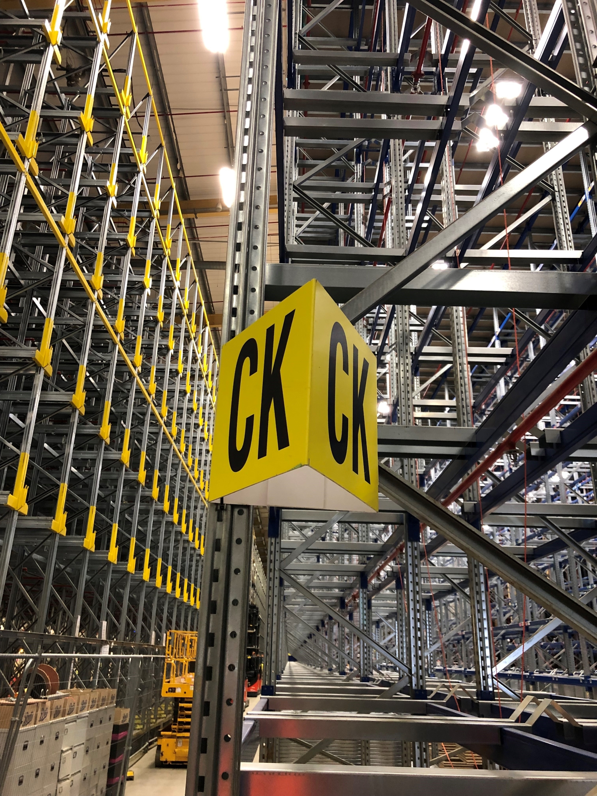 Pyramid end of aisle sign installation